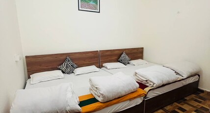 Priya Hotel Room Type - Six Sharing Deluxe Room