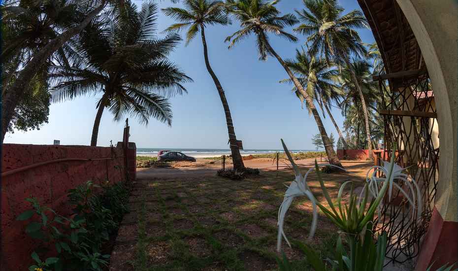 Om Shanti Beach Resort - Tap to explore photos