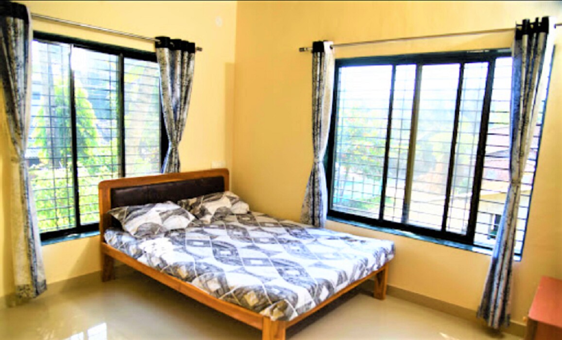 Swapnapurti Cottages | Rooms & Balcony - Tap to explore photos