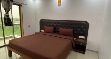 Hotel Nature Shield Lonavala, 12 km from Lonavala Railway Station by Prospera Hospitality Pvt. Ltd. Room Type - Deluxe Room with Balcony and Free Cancellation and Breakfast Hotel Nature Shield Lonavala, 12 km from Lonavala Railway Station by Prospera Hospitality Pvt. Ltd. Room Type - Deluxe Room with Balcony and Free Cancellation and Breakfast