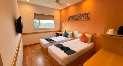 Mango Grove Hotel Room Type - Premium Room - Grove View- Twin Beds Mango Grove Hotel Room Type - Premium Room - Grove View- Twin Beds