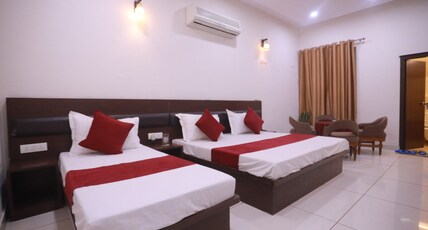 Hotel Abhinandan Room Type - Tripple Sharing Room.