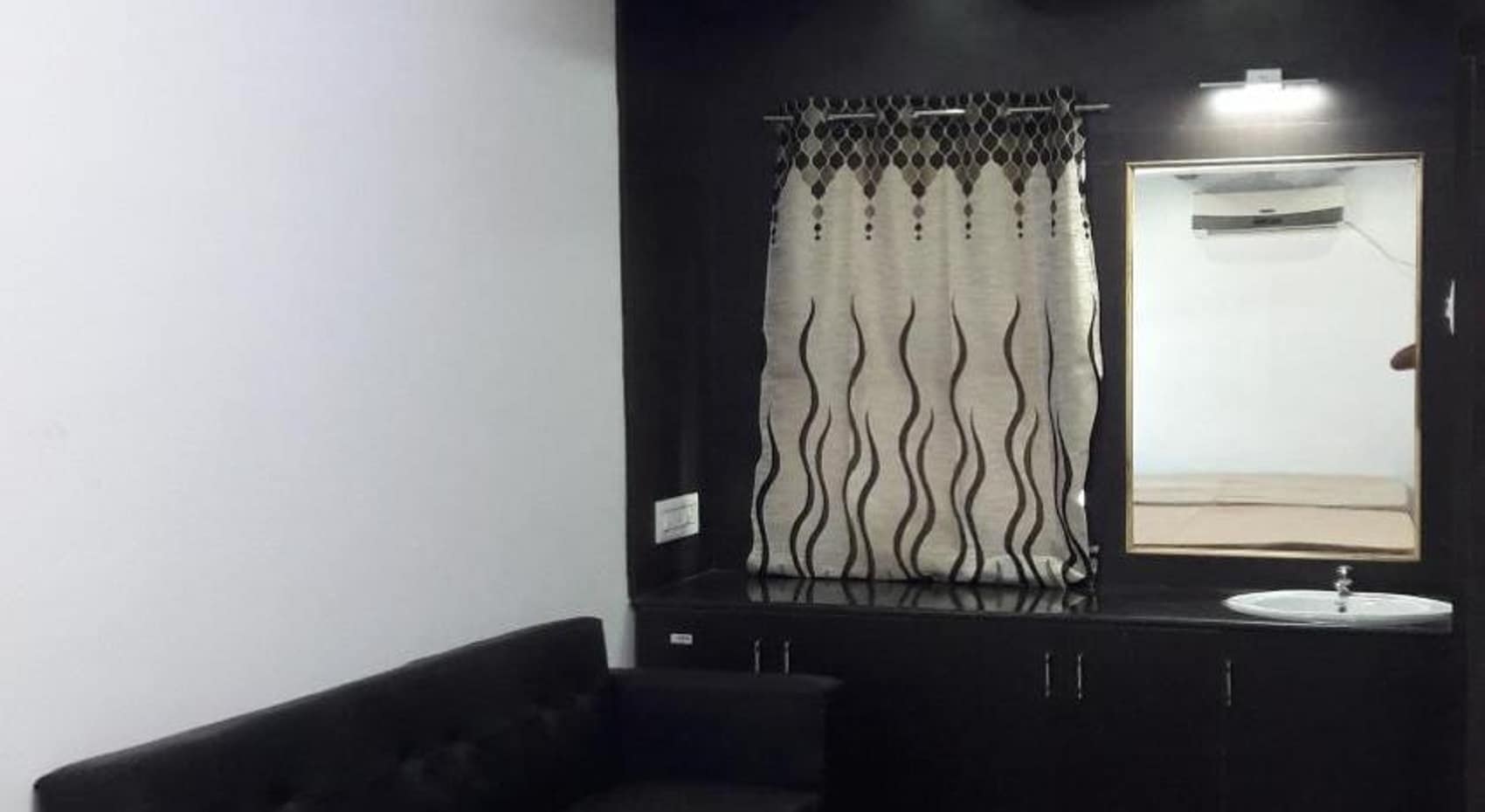 Srirangam Suite Rooms - Tap to explore photos