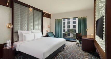 Pullman New Delhi Aerocity Room Type - Superior King Room -Pool View, Wifi, Bathtub Pullman New Delhi Aerocity Room Type - Superior King Room -Pool View, Wifi, Bathtub