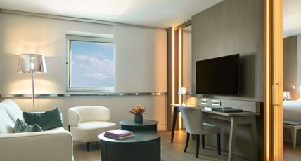 Sofitel Athens Airport Room Type - CLUB SOFITEL SUITE, Club Lounge Access, 1 King Bed, Living Room Sofitel Athens Airport Room Type - CLUB SOFITEL SUITE, Club Lounge Access, 1 King Bed, Living Room