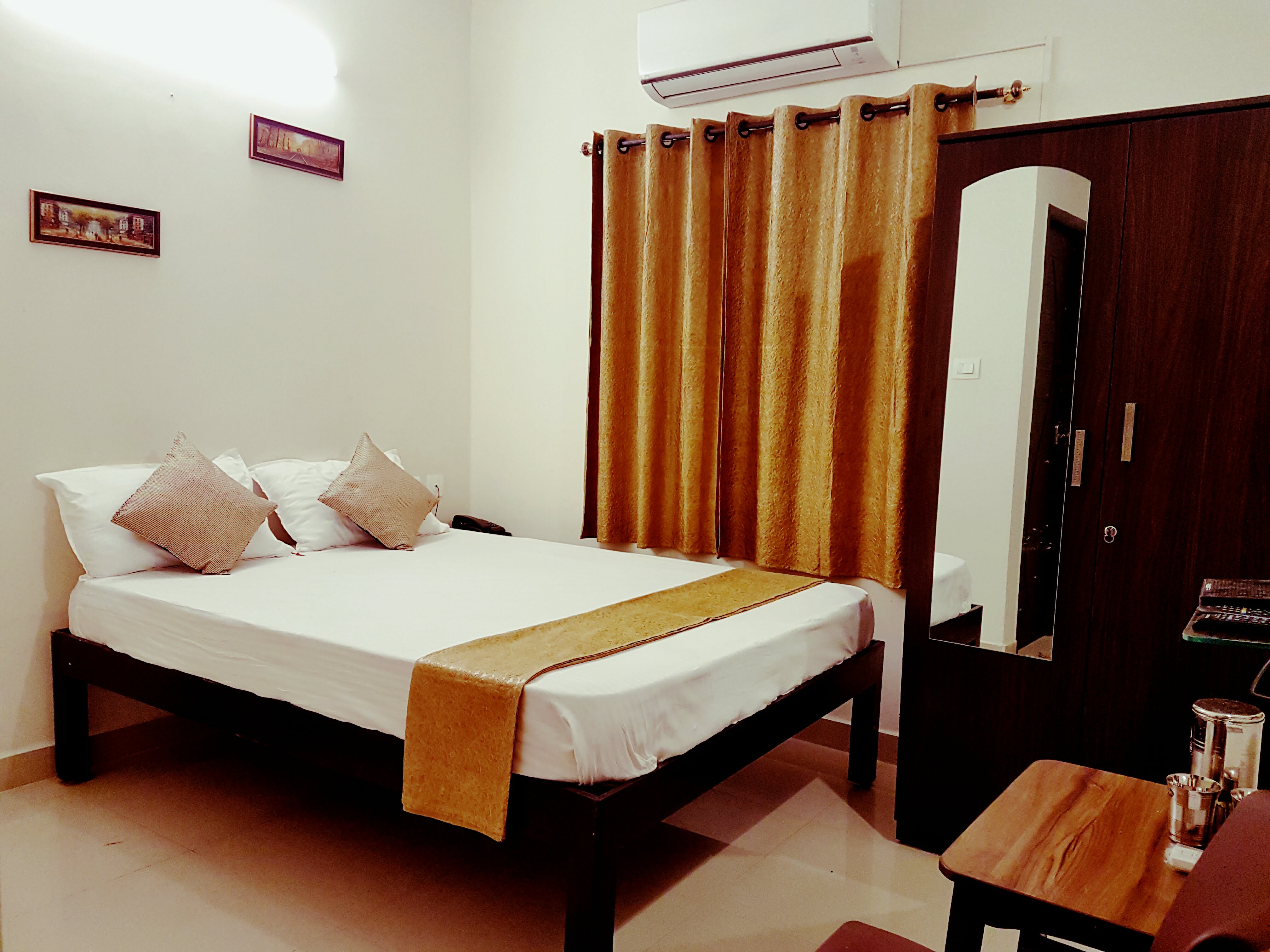 Arjun Inn - Tap to explore photos