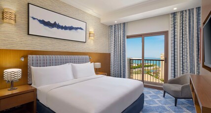 DoubleTree by Hilton Resort  & Spa Marjan Island Room Type - KING ONE BEDROOM SUITE
