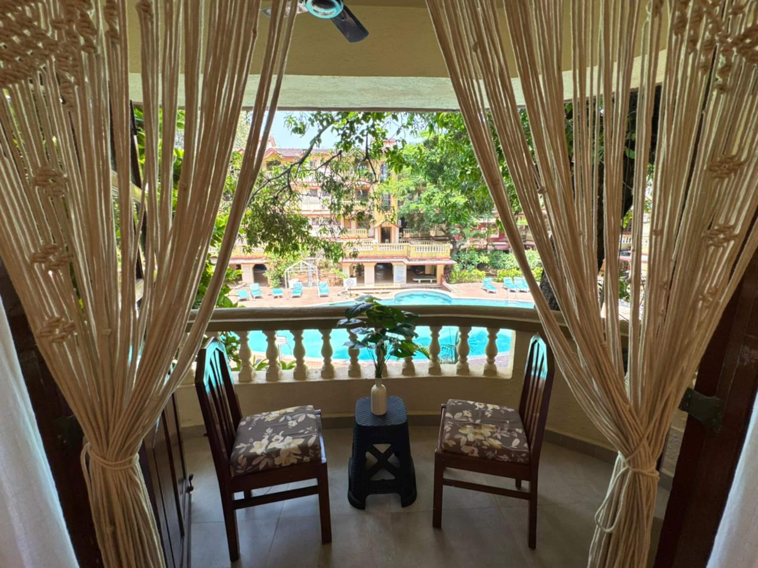 Macram Moss Chic Cozy 2BHK Boho Pool View apt - Tap to explore photos