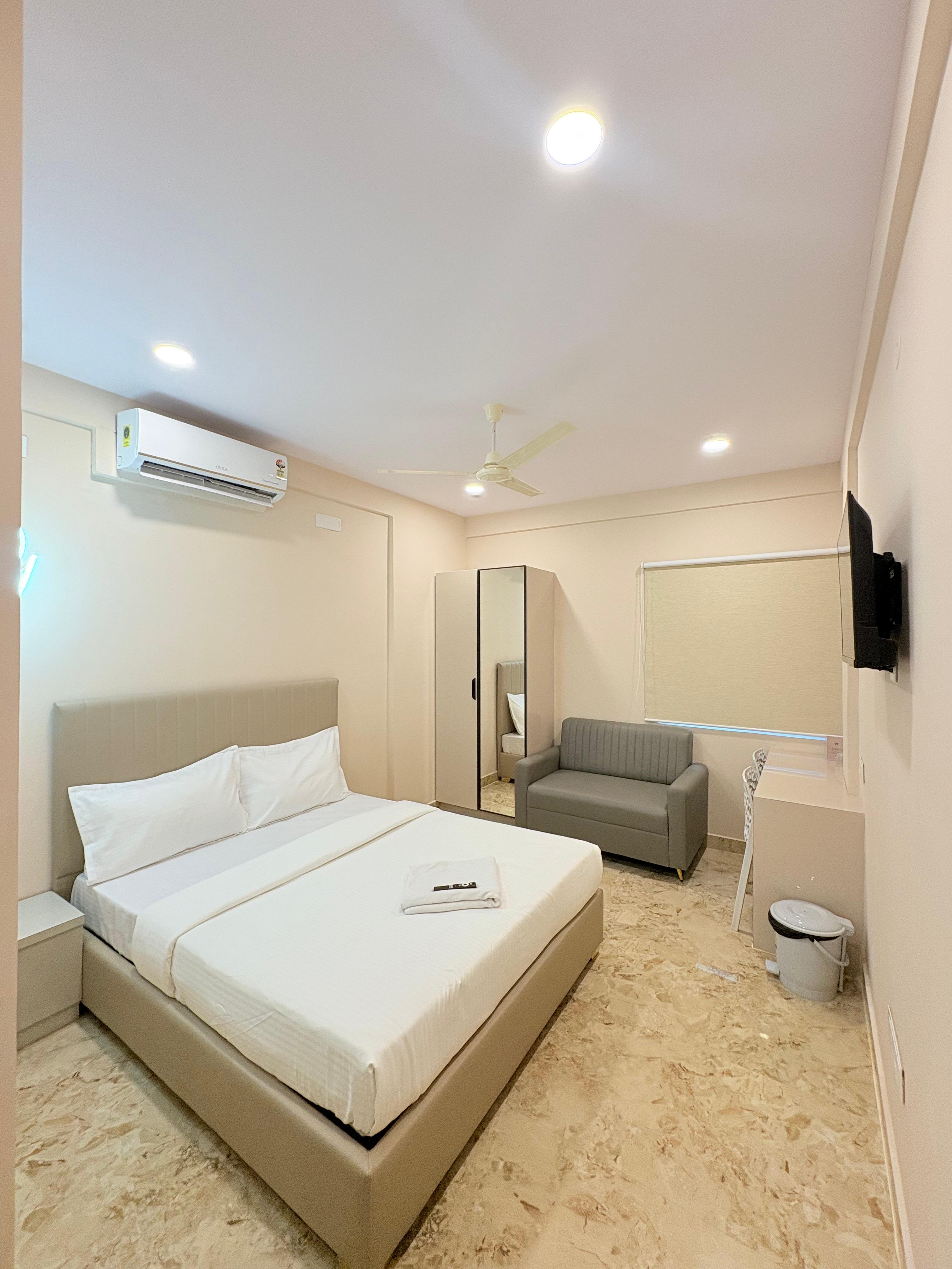 Hotel Wellsuites Electronic City - Tap to explore photos
