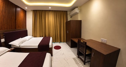 Hotel Balaji Room Type - AC Family Deluxe Room (4 bed) Temple Facing Hotel Balaji Room Type - AC Family Deluxe Room (4 bed) Temple Facing