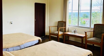 Carnival Homestay Room Type - Family Room(2 bedrooms with attached bathrooms)