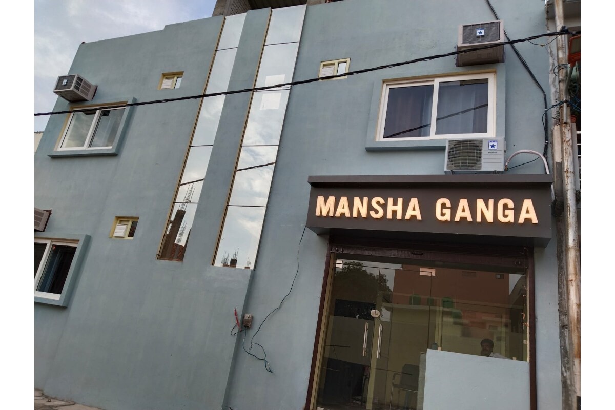 Hotel Mansha Ganga - Tap to explore photos