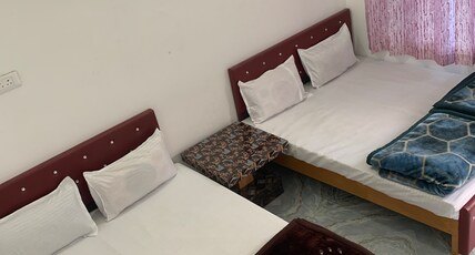 Sainik Dham Room Type - Quadruple Bedroom