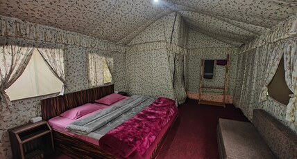 The Heimat Resort | River-view Tents Room Type - garden view swiss camp