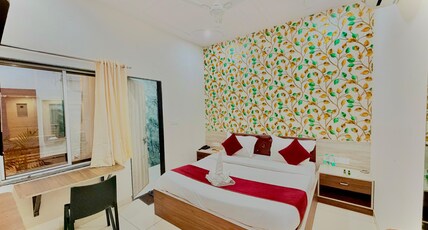 Hotel Santosh Palace (Free Gated Parking & 10 Minutes walk from Temple) Room Type - Deluxe Room