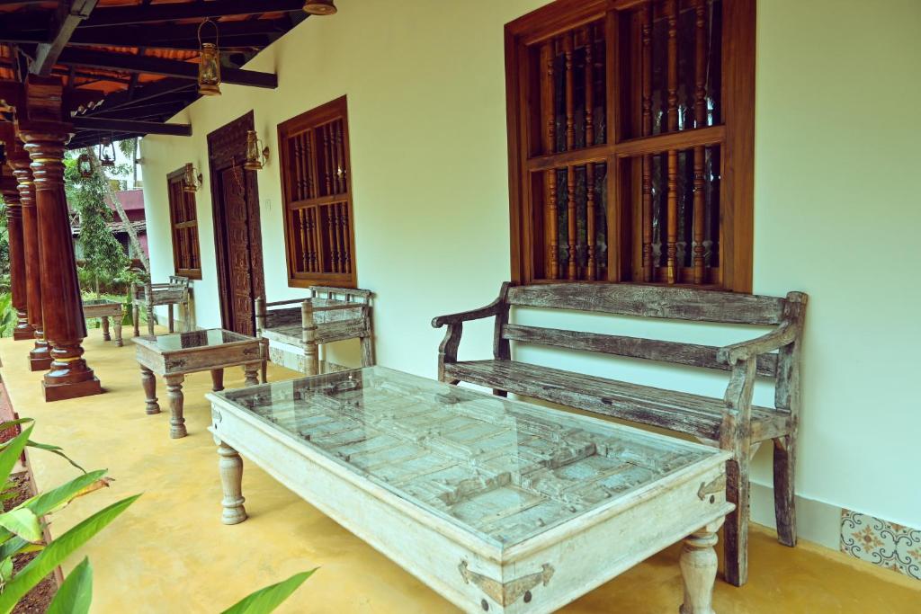 White Serenity Heritage Pool Villa near Beach Udupi - Tap to explore photos