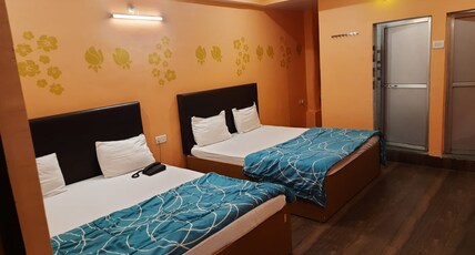 HOTEL J.J. RESIDENCY Room Type - Four Bedded BASIC Room (AC)