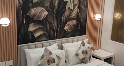 Surya Grand Hotel, Rajouri, West Delhi Room Type - Deluxe Room
