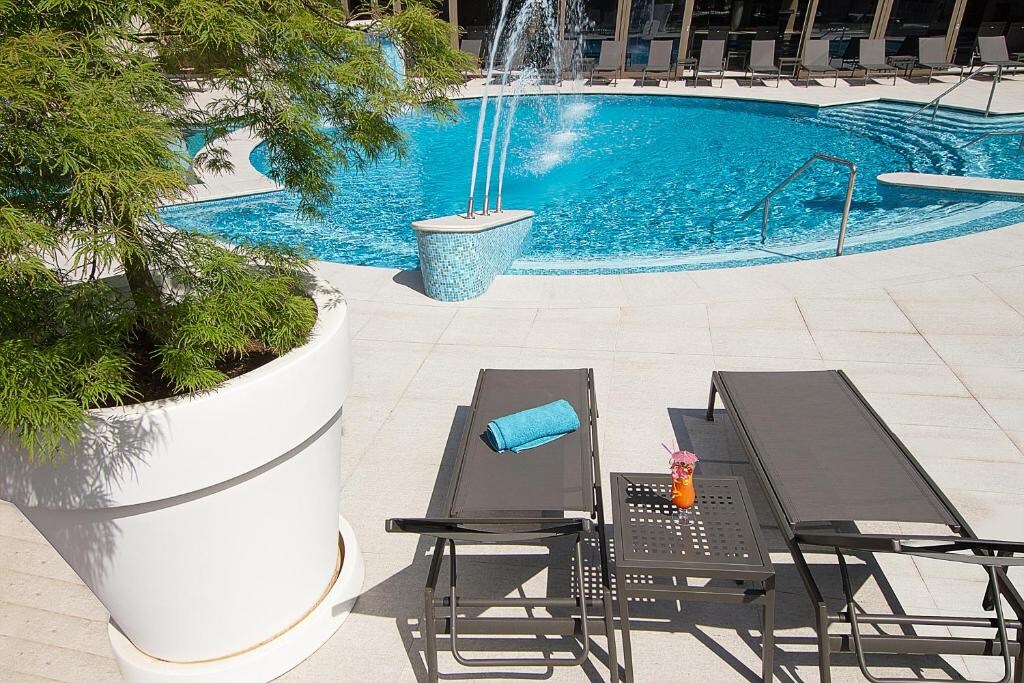 Ramada by Wyndham Bucharest Parc - Tap to explore photos