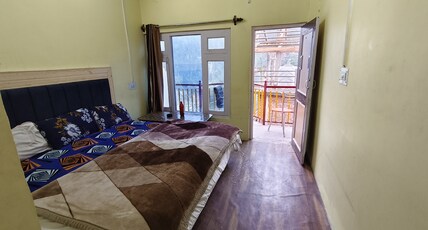 Raj Homestay Room Type - Deluxe Room