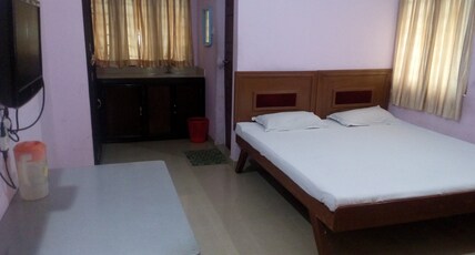 MEGA TOURIST HOME Room Type - DOUBLE BED AC