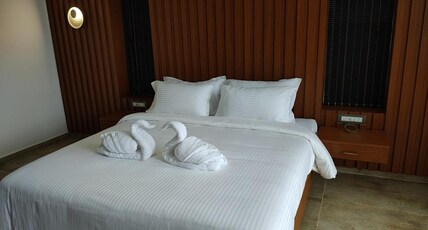 Caligo Cottage Room Type - Luxury Deluxe AC Room With Balcony Caligo Cottage Room Type - Luxury Deluxe AC Room With Balcony