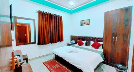 Hotel Sphatic- 5 Mins from KamtaNath Temple. Room Type - Deluxe Room