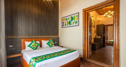 Treebo Premium Torrentium - A Heritage Hotel Room Type - Spacious Premium Room with Garden View