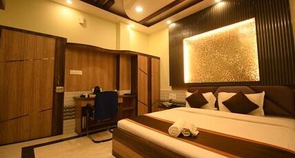 HOTEL ADHUNIK Room Type - Deluxe Double Room