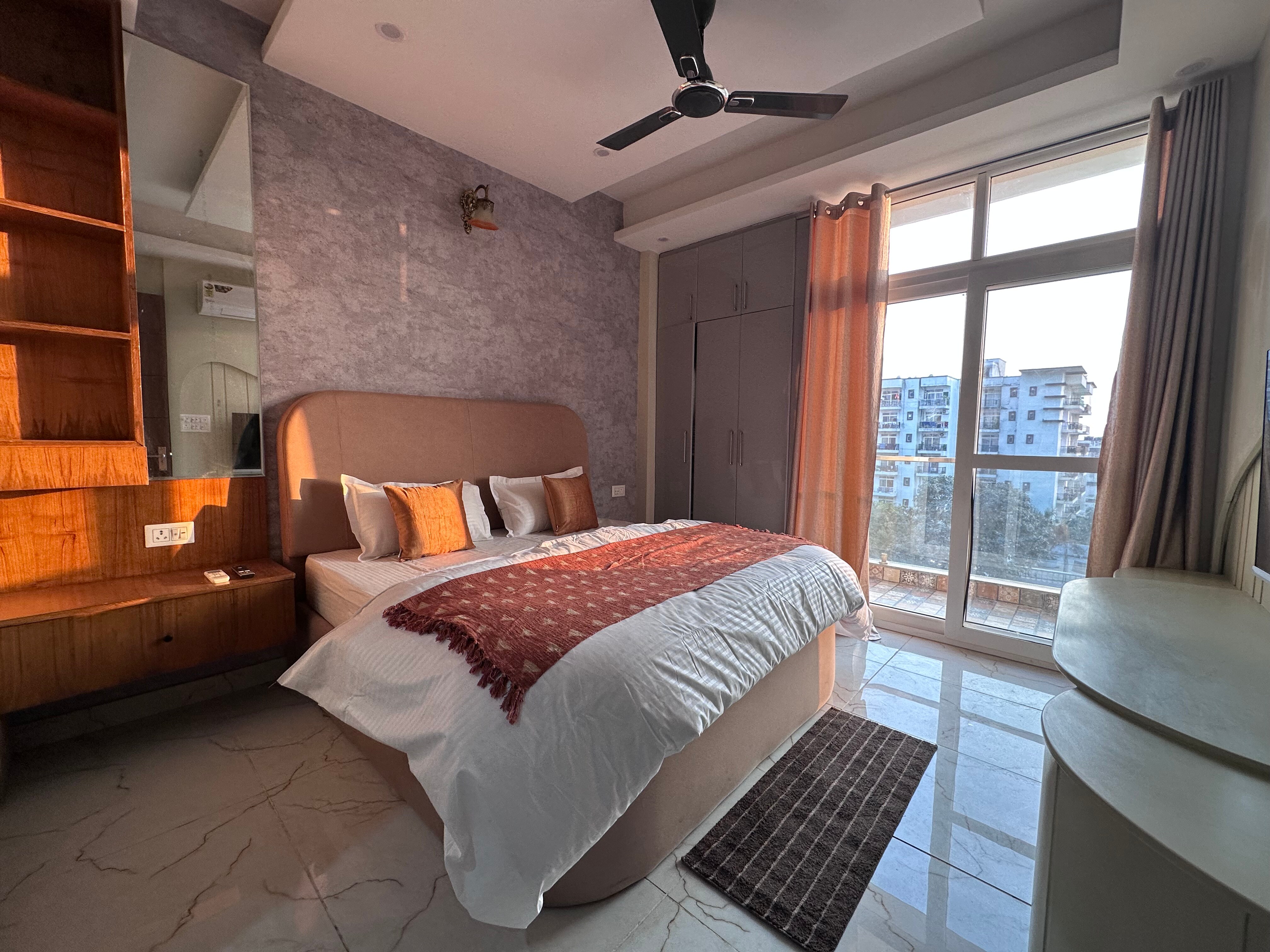 Beige Dusk Near IT Park 2BHK Sunset Balcony - Tap to explore photos