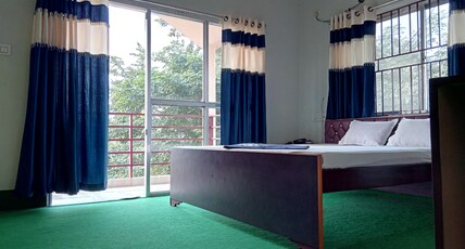SPANGLE WINGS RESORT PVT.LTD Room Type - DELUXE AC ROOM