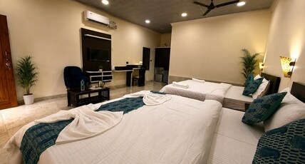 Baga beach heritage resort Room Type - King room with two double bed pool view