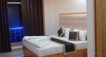 Aditya Residency UK04 | Hills & River View Room Type - Super Deluxe with Balcony