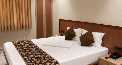 Hotel Dhanashri Room Type - Deluxe Room Non Ac Hotel Dhanashri Room Type - Deluxe Room Non Ac