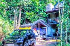 Green portico tent and hut stay