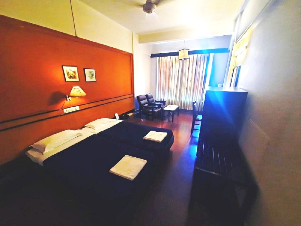 Hotel Sanman Deluxe - Tap to explore photos