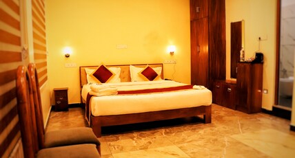 ASR Holidays ,Valparai Room Type - Premium Luxury Family Room - 101