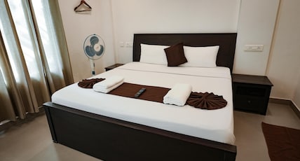 Satra Wayanad Room Type - Deluxe Room with Balcony (Non-AC) Satra Wayanad Room Type - Deluxe Room with Balcony (Non-AC)