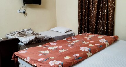 Babaji's Abode Room Type - Small Family Room (AC)