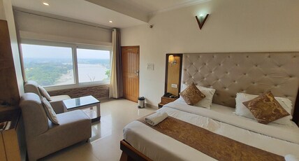 Hotel Ganesha Inn with (Ganga View Rooms) Room Type - Ram Jhula and Ganga View Executive Room