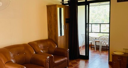 Vythiri Misty Wind Holiday Homes  Room Type - Deluxe double room with small balcony