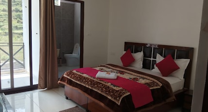 Hotel Shri Mahavir Room Type - Deluxe Room with Balcony and Mountain View Hotel Shri Mahavir Room Type - Deluxe Room with Balcony and Mountain View