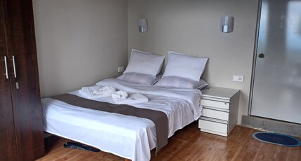 HILLS ABODE HOMESTAY SHILLONG Room Type - DELUXE ROOM 1