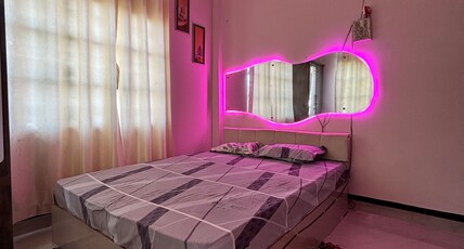 Stay N Joy Deluxe Room Room Type - Bedroom 1