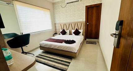Aaditri Inn Room Type - Deluxe Double Room )