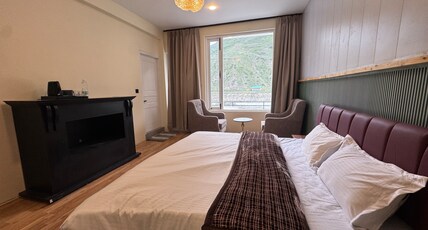 Hobknob - Stay | Cafe | Experience Room Type - Luxury Room with Balcony and River View