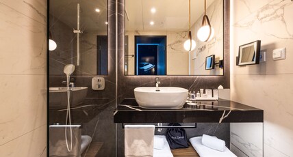 Radisson Blu Hotel at Porsche Design Tower Stuttgart Room Type - Superior Room - Corner
