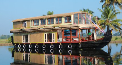 SREEKRISHNA HOUSEBOATS Room Type - 3 bedroom a/c deluxe private houseboat with all meals  (6pax)AC timing 9 Pm to