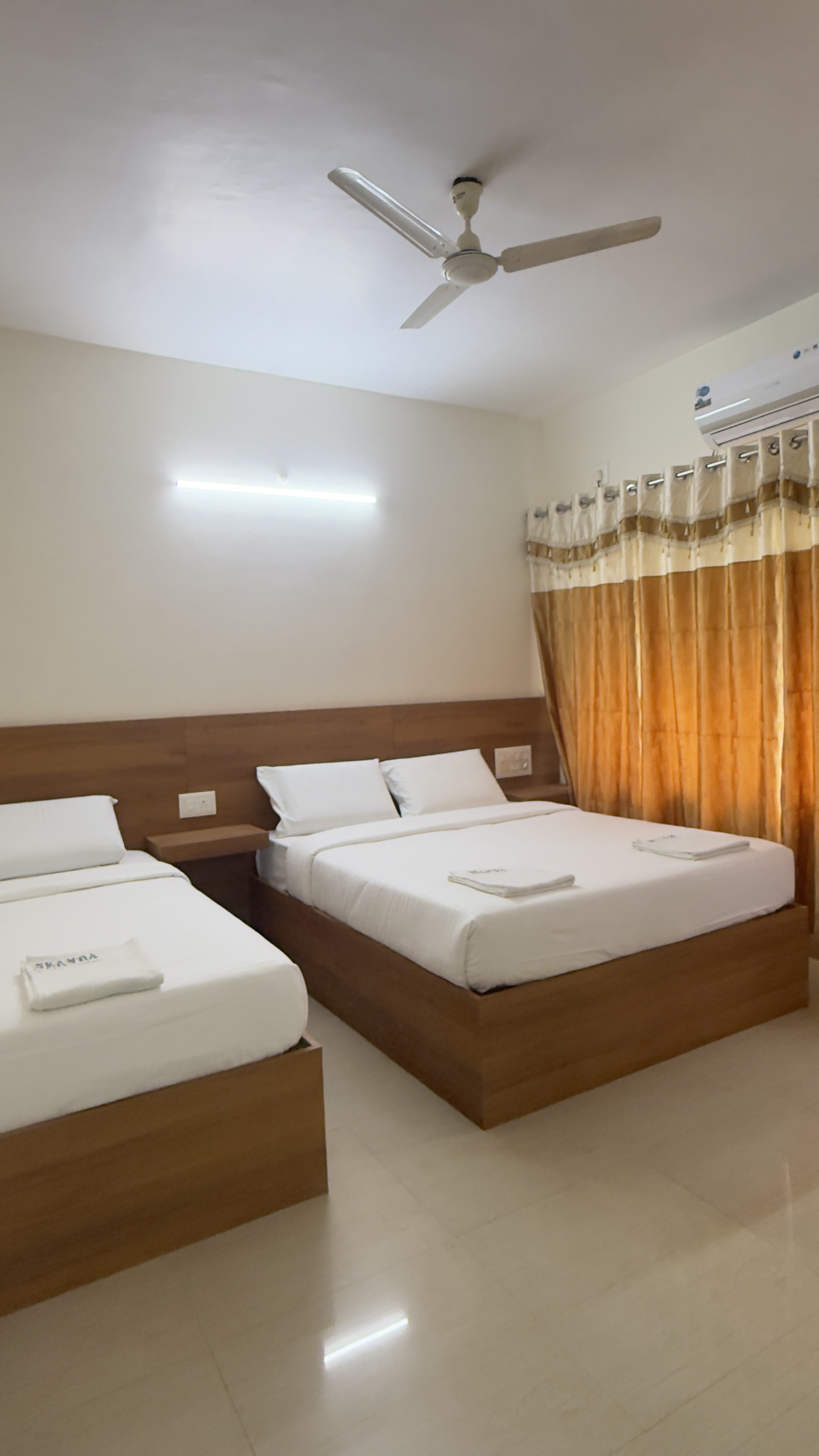 Hotel Sai Skanda - Tap to explore photos