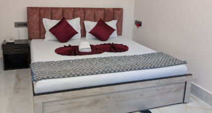 Hotel Delux International Room Type - Deluxe Room